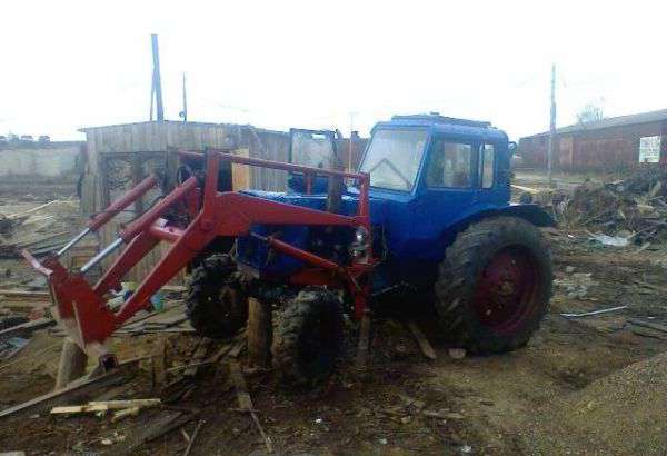 на фото: Продаю трактор мтз 82 с лесным куном