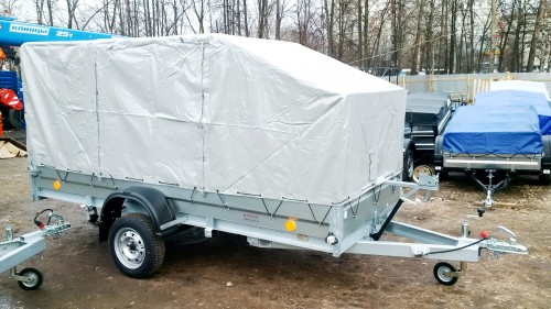 на фото: Автоприцеп легковой 3,5х1,4м. для перевозки снегохода 2015 года