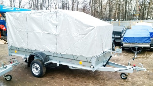 на фото: Автоприцеп легковой 3,5х1,4м. для перевозки снегохода 2016 года